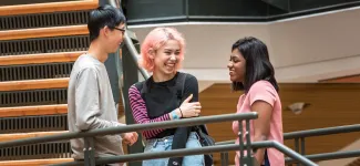 Students Chatting on Stairwell