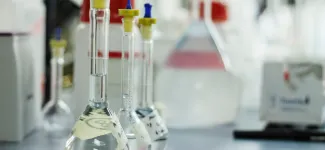 Flasks on a bench in a chemistry lab